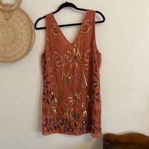 Beaded free people mini dress. Missing a few sequins.